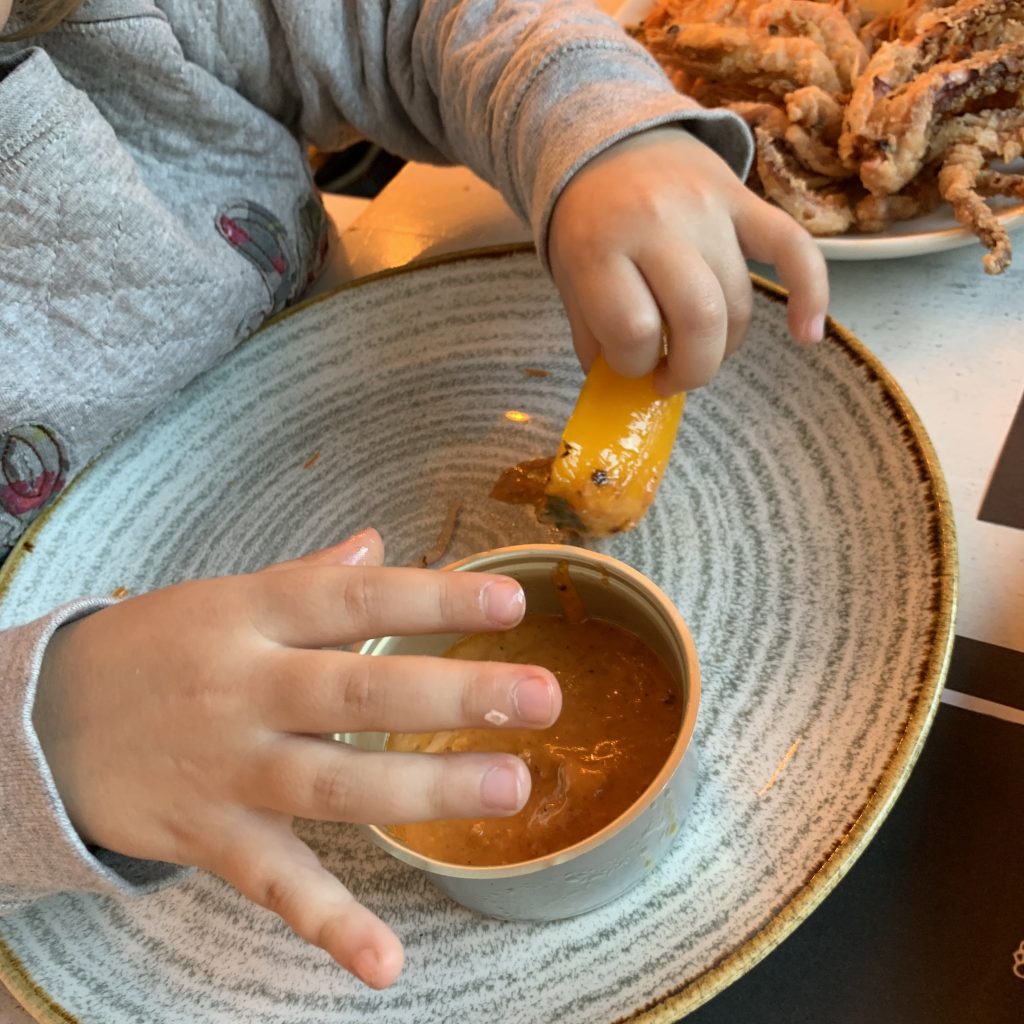 baby eats in restaurant