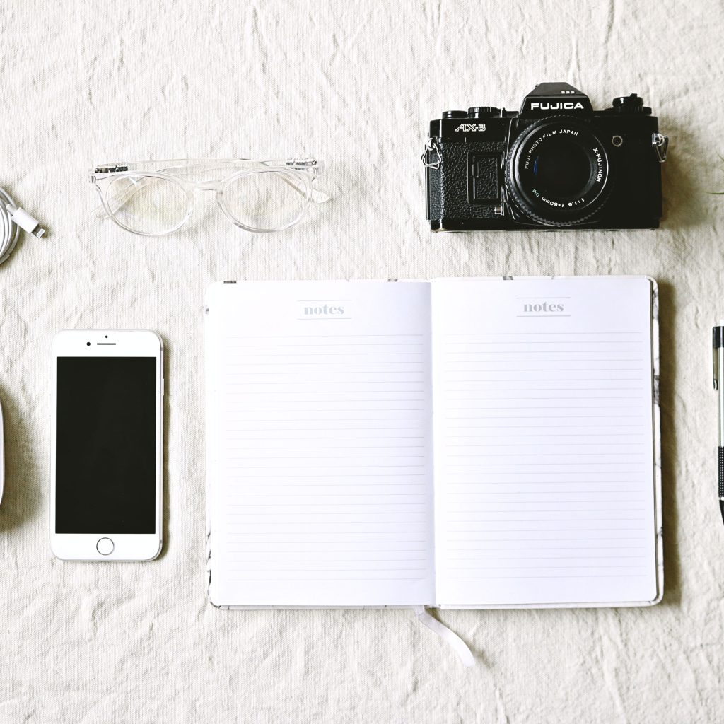 A journal and a camera.