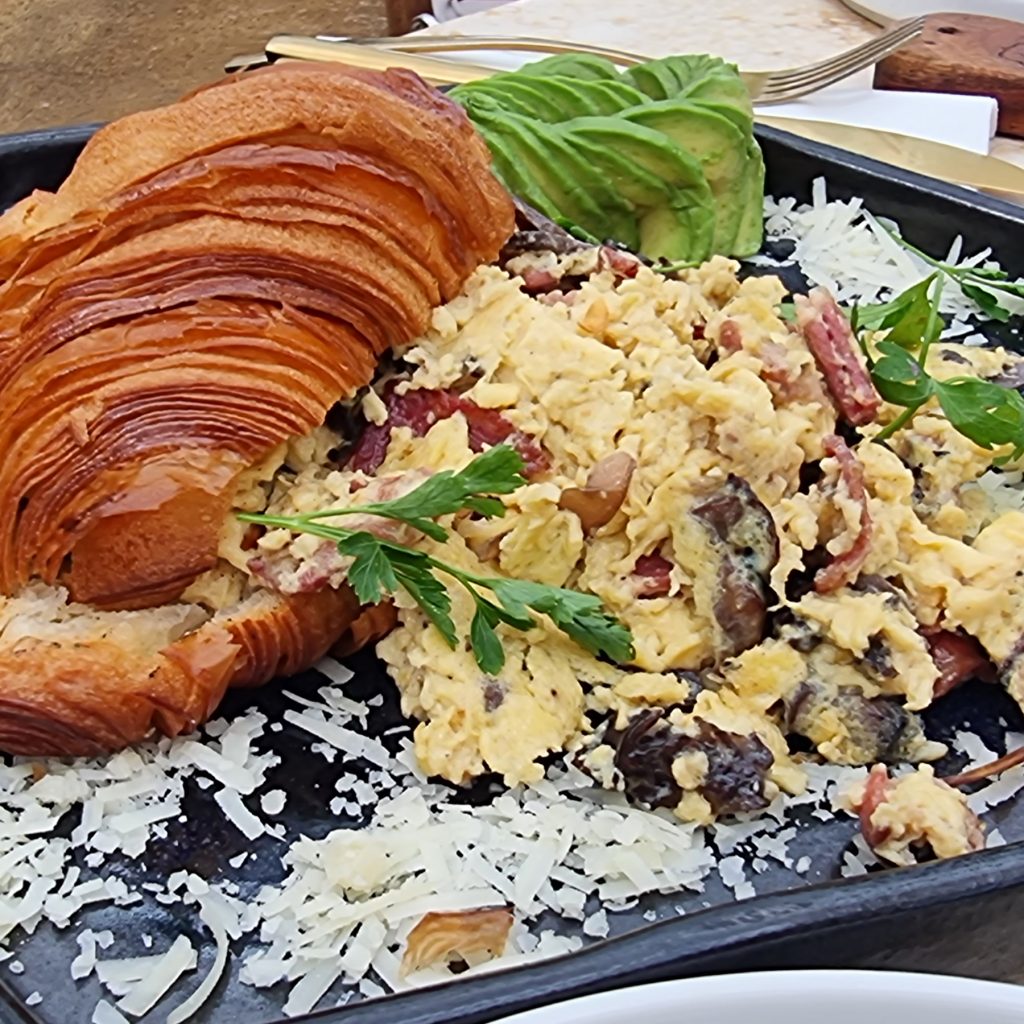 croissant with scrambled eggs at Dubai Brunch and Cake